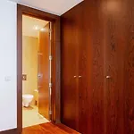 Premium Flat W/ Pool, Gym & Garage By Hostwise *