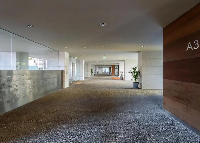 Premium Flat W/ Pool, Gym & Garage By Hostwise *